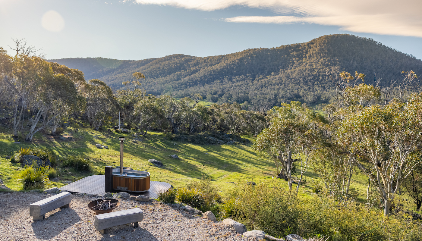Outdoor woodfired hot tub at a luxury cabin in the Snowy Mountains